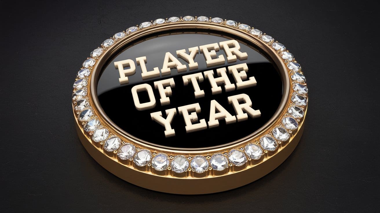 Zlatni bedž ukrašen dijamantima sa natpisom "igra? godine" na crnoj podlozi.