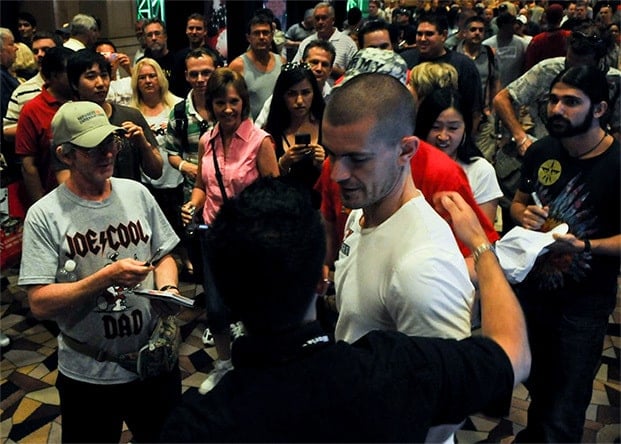 gus-hansen-with-fans-wsop-poker