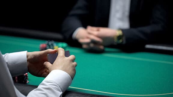 poker game in progress between two people